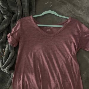 purple american eagle shirt